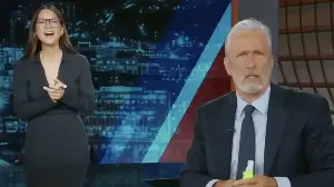 See Jon Stewart Shamelessly Use Olivia Munn To Pay Tribute (And Poke Fun At) Stephen Colbert's Last Show