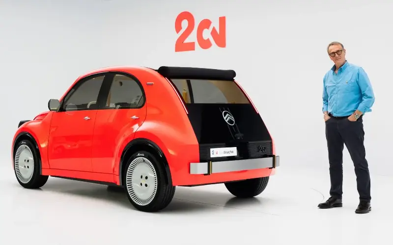 Writer Andrew English pictured with the new battery-powered Citroën 2CV - Simon Thompson