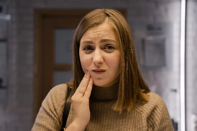 Regular consumption of energy drinks can lead to tooth sensitivity. 