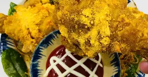 How to make crispy fried chicken thighs with cheese seasoning: An addictive treat that kids will love.