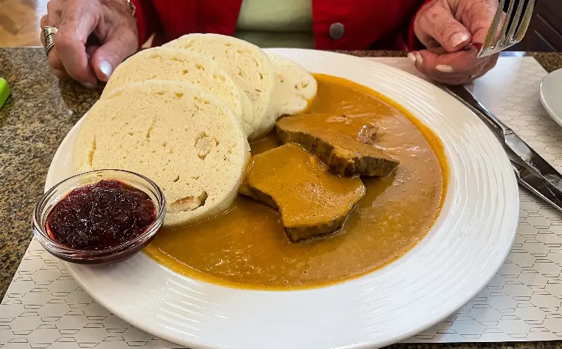 Svickova seved with bread dumplings and cranberry sauce - Brian Logan/iStockphoto