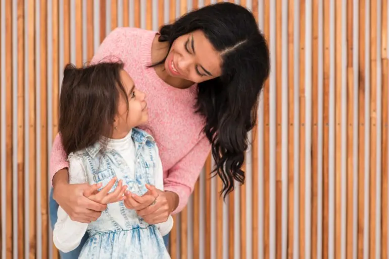 Mom and daughter looking at each other