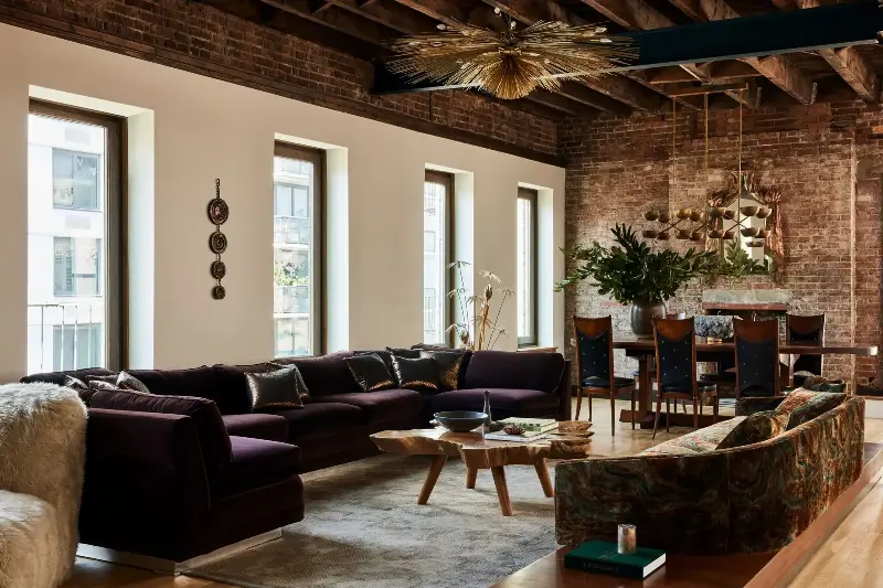 Purple sofas are definitely on trend for 2027, but they have a moody and timeless feel when styled well. (Image credit: Nicole Franzen. Design: Evan Edwards)