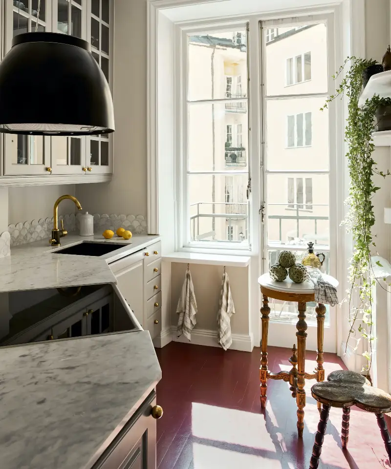 Cabinet design needs to get clever in a small kitchen, and sometimes just adding in more cabinetry is not the answer to a harder working kitchen.  (Image credit: Elin Straat / Kavand Interiors)