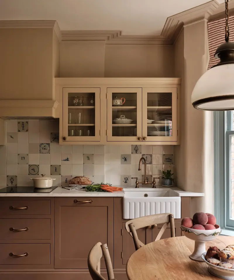Timeless cabinetry layered with interesting surfaces and finishes prove you don't need fleeting trends to make a lasting impression. (Image credit: Uns Hobbs / Astrid Templier Photography)