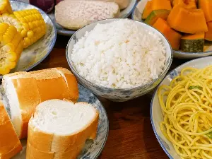 How can we eat carbohydrates to get enough energy without accumulating excess fat?