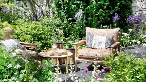 The Garden Layering Secret Designers Use to Transform Bare Patios into Lush, Floral Havens