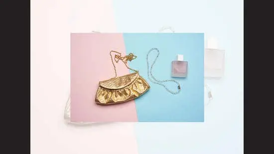 Pair an outfit with a sling bag for a day look and a clutch for evening events. (ADOBE STOCK)