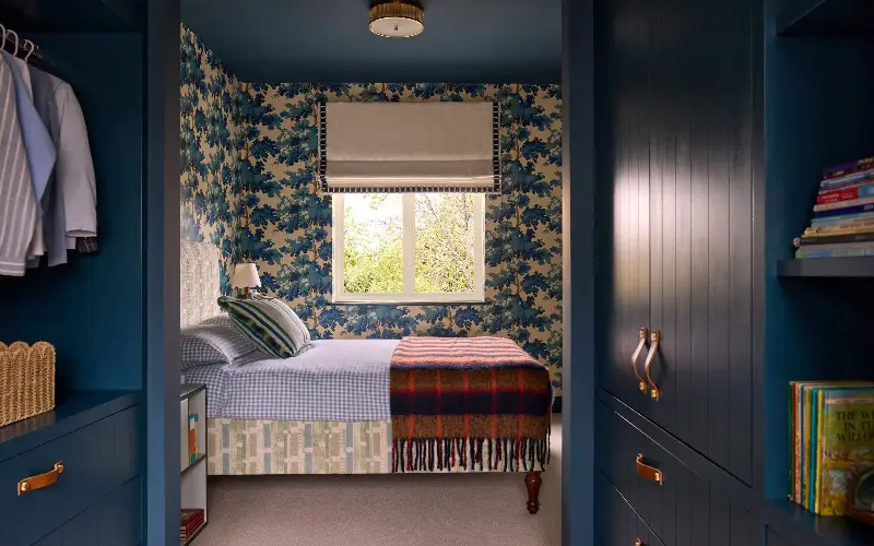 The owners’ son’s forest-themed bedroom with Raphael wallpaper in blue by Sandberg - Boz Gagovski