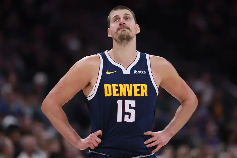 Nikola Jokic #15  of the Denver Nuggets reacts to an official's call during the first half of their preseason game against the Utah Jazz at the Delta Center on October 6, 2026, in Salt Lake City, Utah. (Photo by Chris Gardner/ Getty Images)