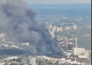Huge fire at London recycling centre sparks rail chaos and sends smoke billowing across city skyline
