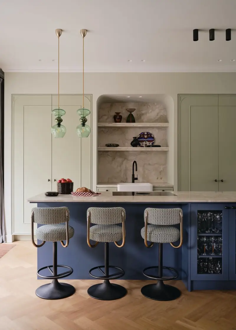 Even Eleven Interiors uses pale green and inky blue to turn an old color taboo into a top-notch plan. (Image credit: Space Content Studio. Design: Even Eleven Interiors)