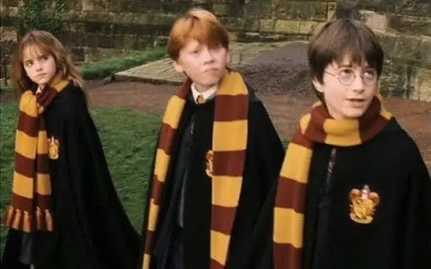 The Potter trio in their famous Gryffindor stripes