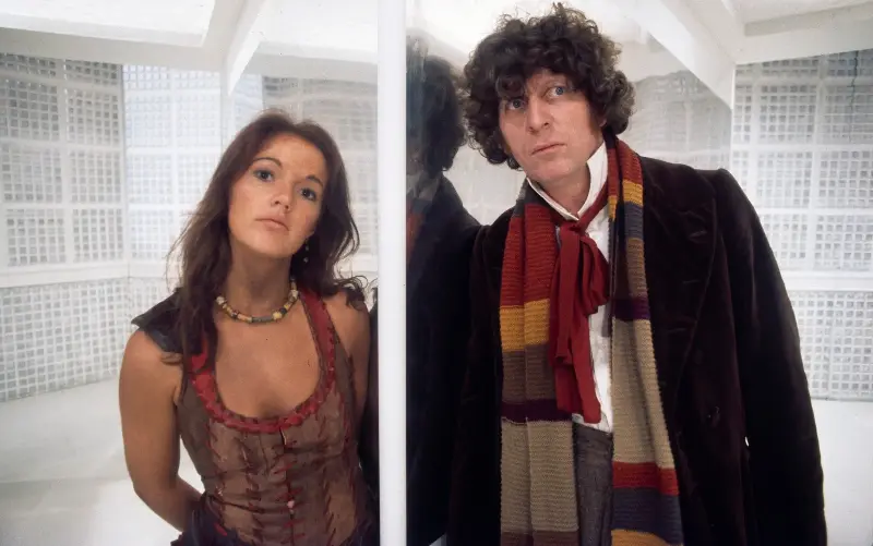 Tom Baker wears his trademark long scarf in a 1977 episode of Doctor Who - BBC