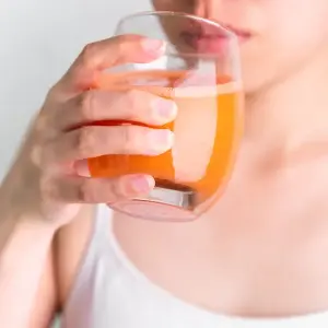 How does the body change when drinking carrot juice every day?