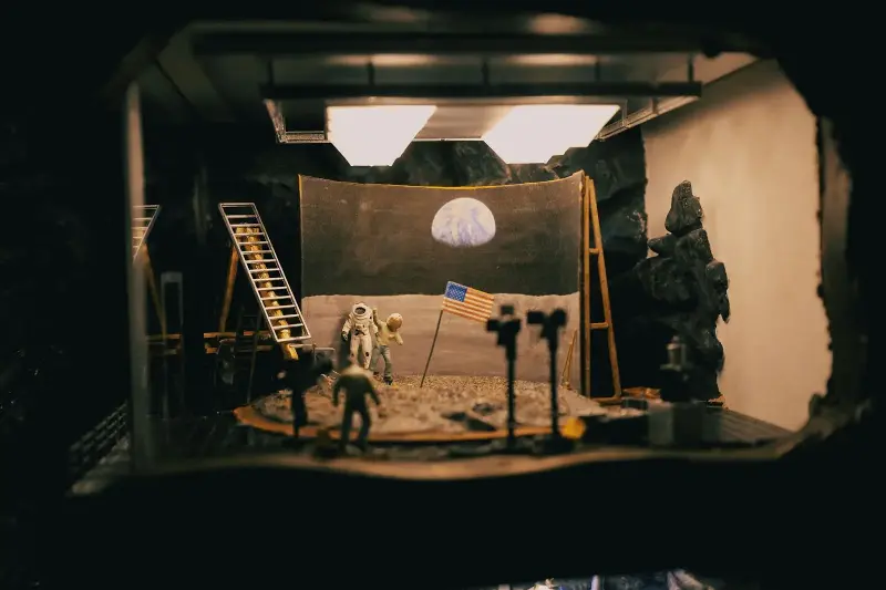 Gene Cernan beside the Apollo 17 lunar rover on the Moon