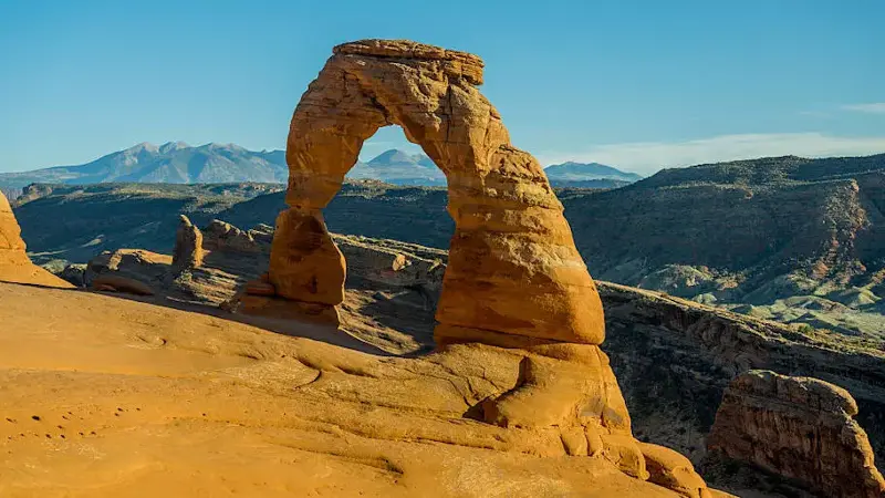 Delicate Arch at sunset in Arches National Park near Moab,...